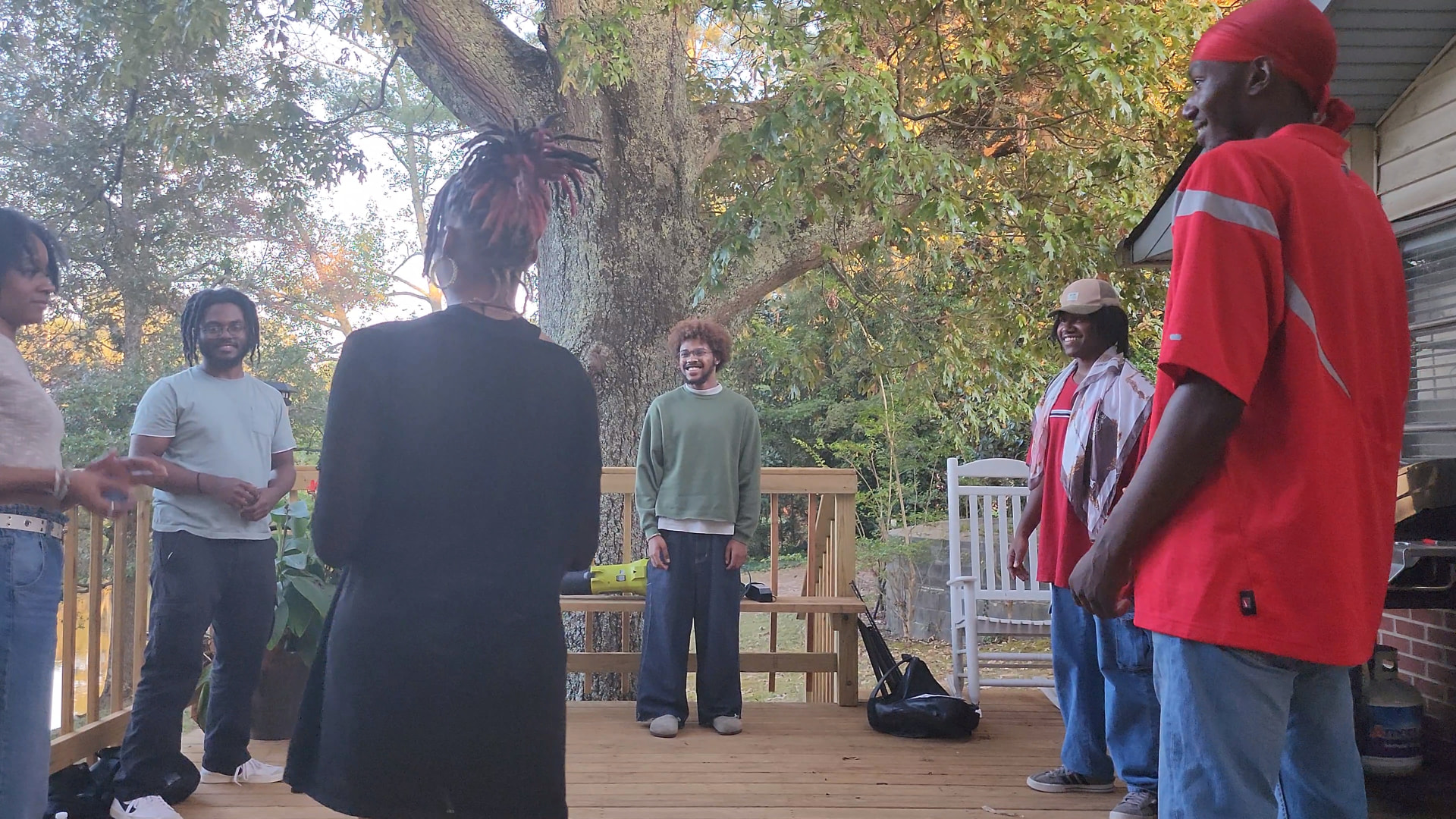 HIP Soul Fest workshop participants gathered together on an outdoor porch